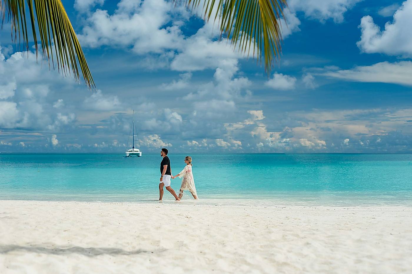 Honeymoon couple on a tropical Zanzibar beach